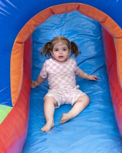 if Amelia Seaberg, age 2, enjoys the bouncy slide